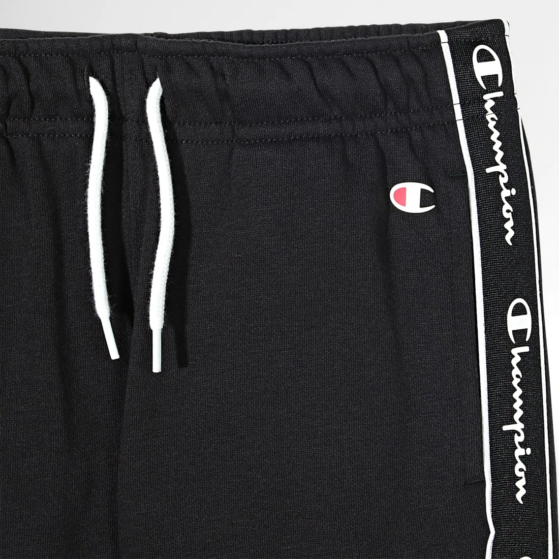 Pantalon Jogging A Bandes Enfant 306114 Noir de Champion 4 Pantalon Jogging A Bandes Enfant 306114 Noir de Champion – Image 2